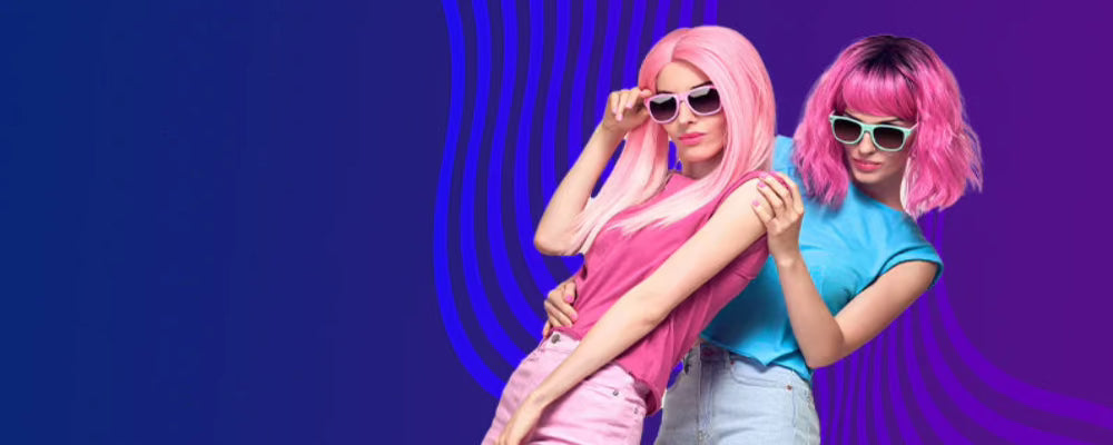 Two women with pink hair posing against a purple background with wavy lines.